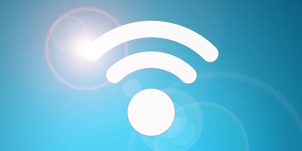 wifi icon of a white circle with two white arches if increasing size over top