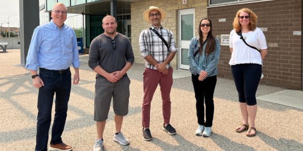 Five members of the Library Board standing outside Alton Branch