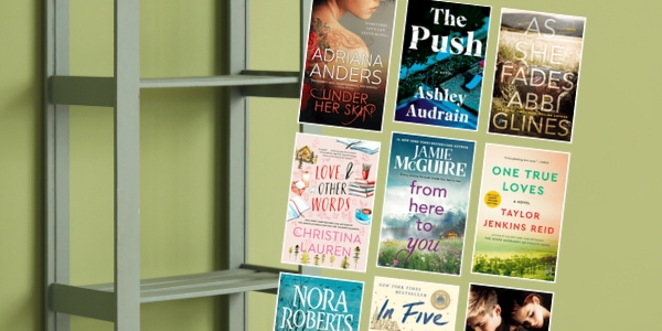 green bookself and wall with various book covers