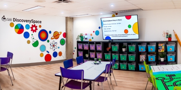 interior view of DiscoverySpace tables and activity bins