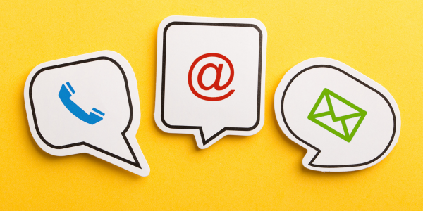 telephone, email, and mail icons in speech bubbles against a yellow background