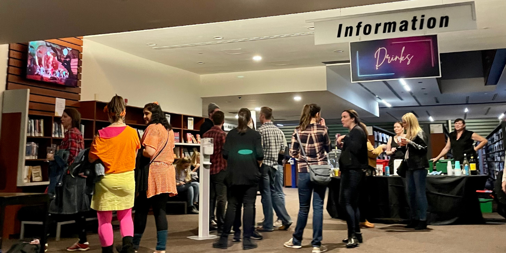 bar with line of people