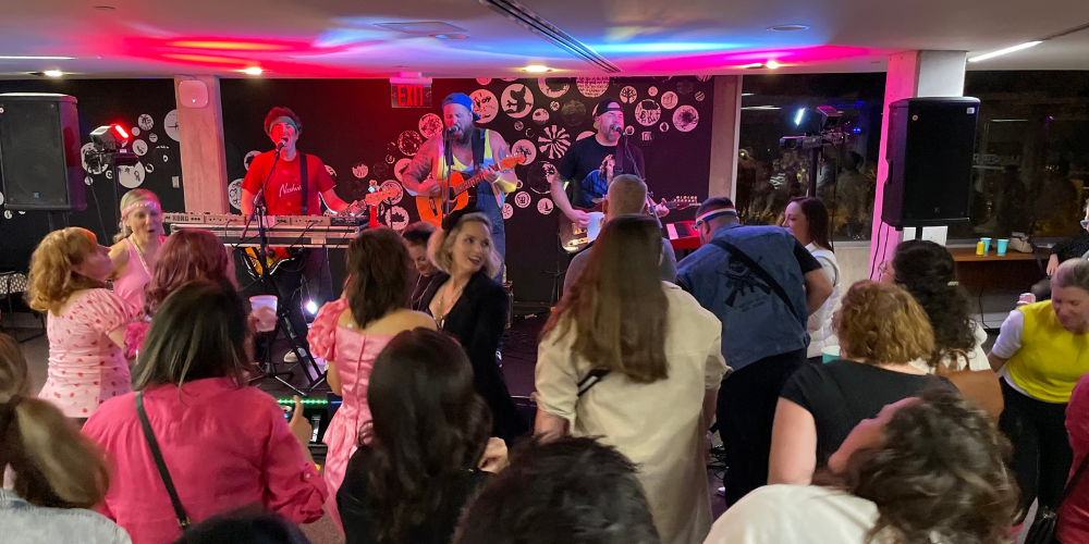 people dancing in front of stage