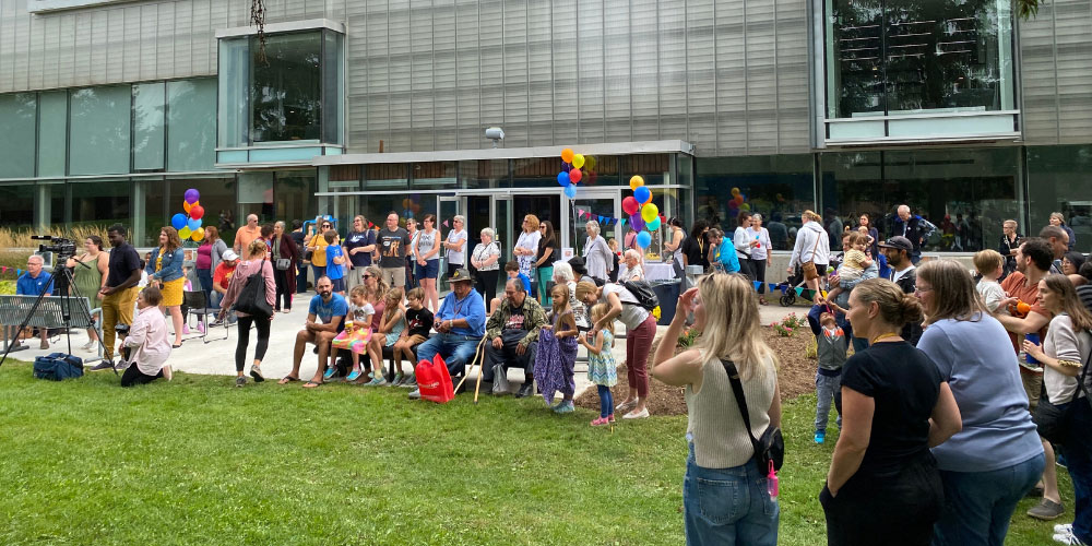 A large crowd gathers outside Central Branch