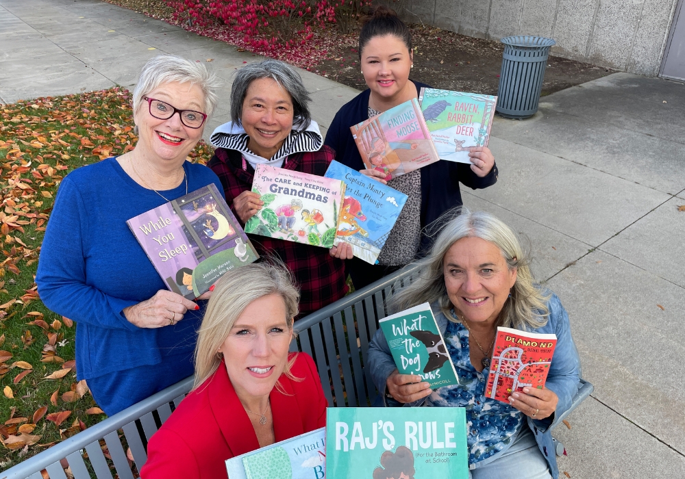 five authors holding their books, Jennifer Maruno, Jennifer Mook-Sang, Jennifer Faria, Lana Button, and Sylvia McNicoll