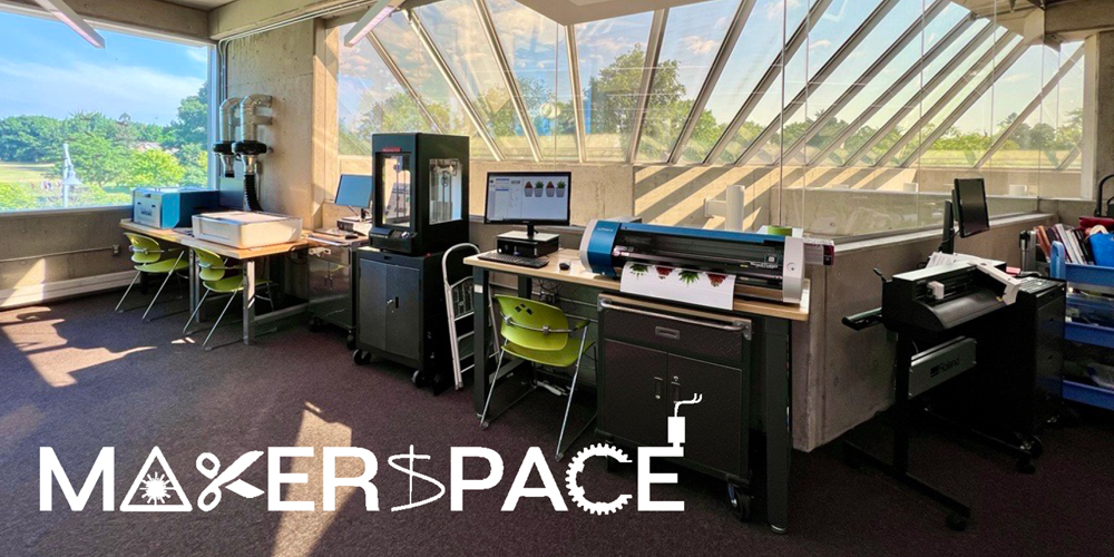 wide view of the makerspace showing 3d printer, laser cutter, vinyl printer and cutter.