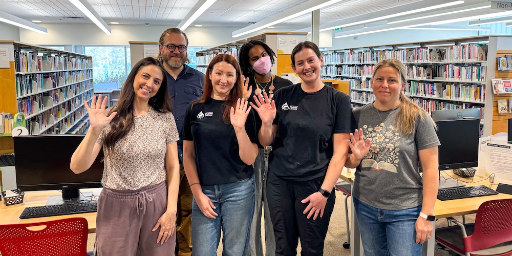 library staff waving 