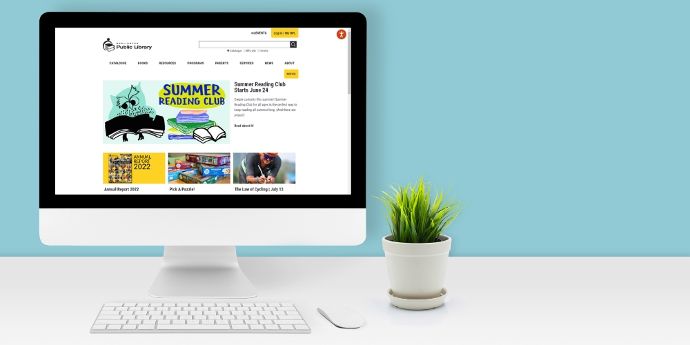 desktop computer monitor displaying the library's website home page